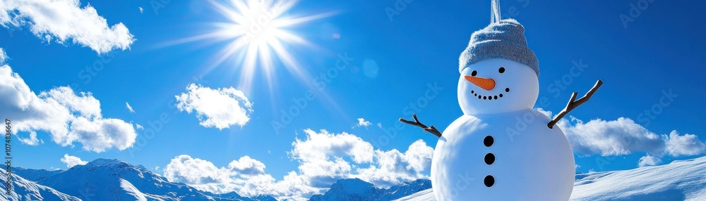 A cheerful snowman stands against a bright blue sky with fluffy clouds and a shining sun. A cheerful snowman stands against a bright blue sky with fluffy clouds and a shining sun.
