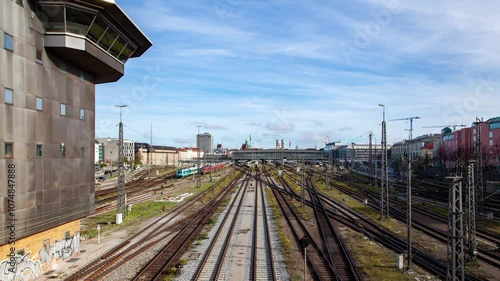 Bustling Hackerbrücke: Time-Compressed Munich Railway Scene photo