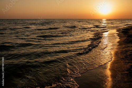 Sunset on the sandy beach in Dzhemete