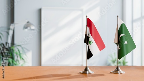 FLAGS OF IRAQ AND PAKISTAN ON TABLE photo