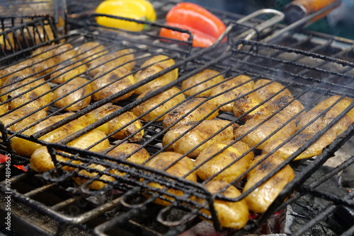 Fried potatoes. Potatoes are cooked on red-hot coals in chargrill