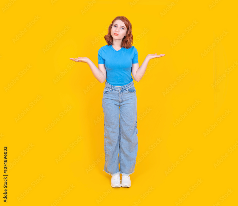 Unsure woman, full body length young caucasian unsure woman shrug shoulders open hands two side say I don't know, I have no idea isolated on yellow background, copy space. Unsure woman, full body length young caucasian unsure woman shrug shoulders open hands two side say I don't know, I have no idea isolated on yellow background, copy space.