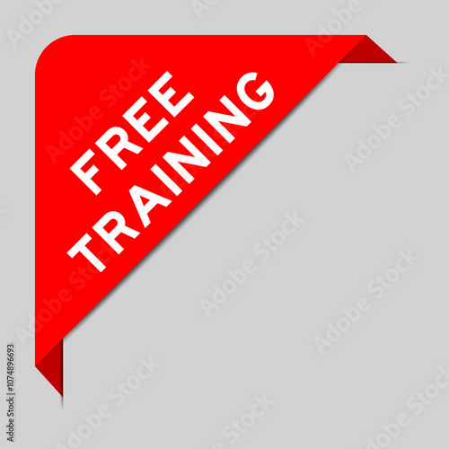 Red color of corner label banner with word free training on gray background