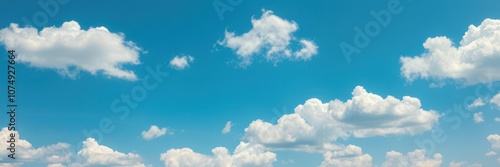 White fluffy cloud floating against a clear blue sky, beauty, sunny