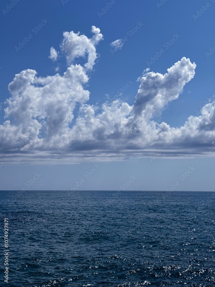 Sea shiny waves, blue sky and amazing clouds. Sea shiny waves, blue sky and amazing clouds.