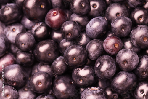 Ripe acai berries as background, closeup view photo