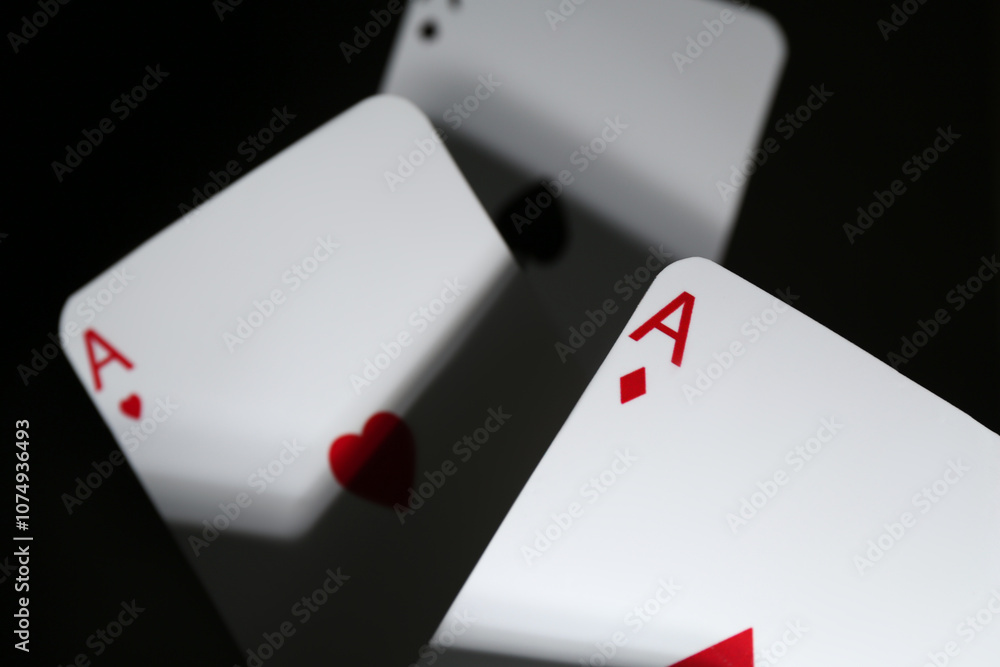 Obraz premium Poker game. Playing cards on black background, closeup