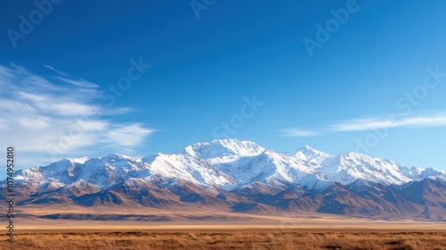 Majestic mountains showcase the beauty of nature under a clear blue sky