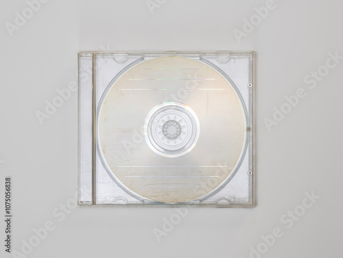 Empty CD in a transparent jewel case on a white background. Compact disc in a scratched and used plastic box. Blank template for a music EP or LP mockup.