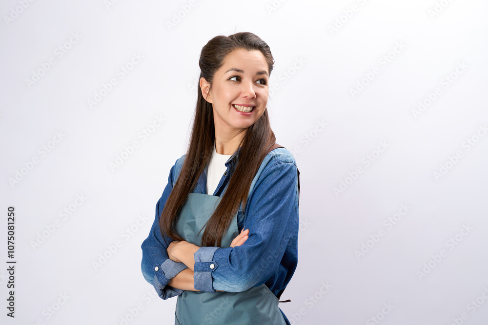 Beautiful young woman wearing apron, looking back over her shoulder, full length portrait, vertical Beautiful young woman wearing apron, looking back over her shoulder, full length portrait, vertical