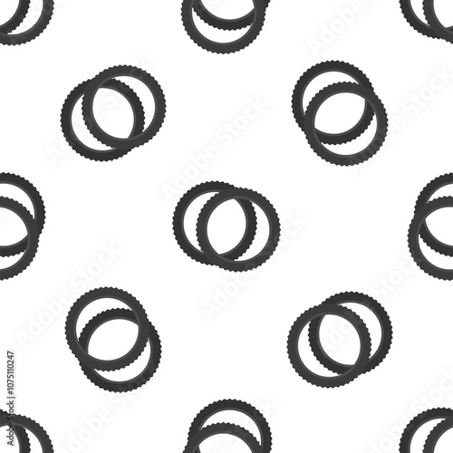 Seamless pattern with two black rubber tires intersecting, creating a dynamic and repetitive design on a clean white backdrop