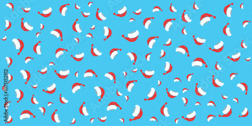 festive pattern featuring red santa hats with white trim and pom-poms scattered on a bright blue background