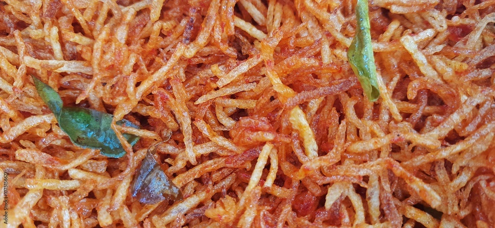 Kentang kering mustofa balado or dried crispy spicy potatoes is delicious traditional food from Indonesia Kentang kering mustofa balado or dried crispy spicy potatoes is delicious traditional food from Indonesia
