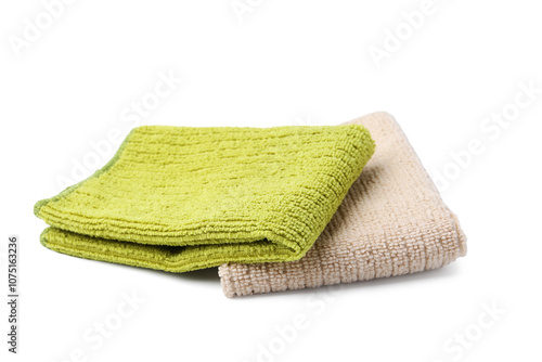 Green and beige microfiber cloths isolated on white