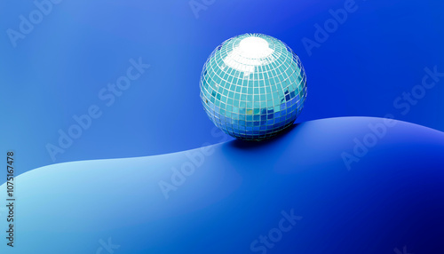 A mirrored disco ball rests on a smooth blue surface with a gradient blue background.