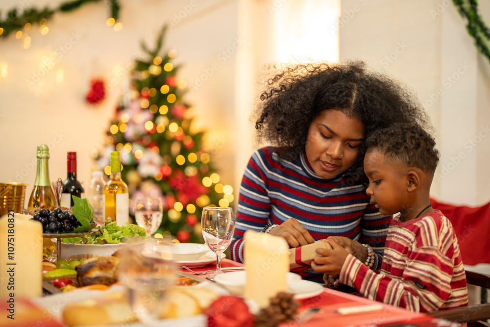 A cheerful holiday dinner scene with a diverse family enjoying a festive meal. Christmas decorations, gifts, and a lit Christmas tree create a cozy atmosphere, enhancing the warmth of the celebration. A cheerful holiday dinner scene with a diverse family enjoying a festive meal. Christmas decorations, gifts, and a lit Christmas tree create a cozy atmosphere, enhancing the warmth of the celebration.