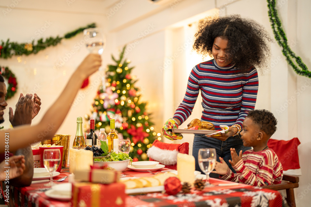 A cheerful holiday dinner scene with a diverse family enjoying a festive meal. Christmas decorations, gifts, and a lit Christmas tree create a cozy atmosphere, enhancing the warmth of the celebration. A cheerful holiday dinner scene with a diverse family enjoying a festive meal. Christmas decorations, gifts, and a lit Christmas tree create a cozy atmosphere, enhancing the warmth of the celebration.