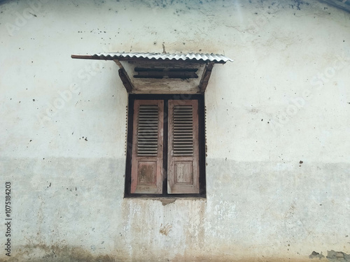 Old Window View of old windows and worn walls