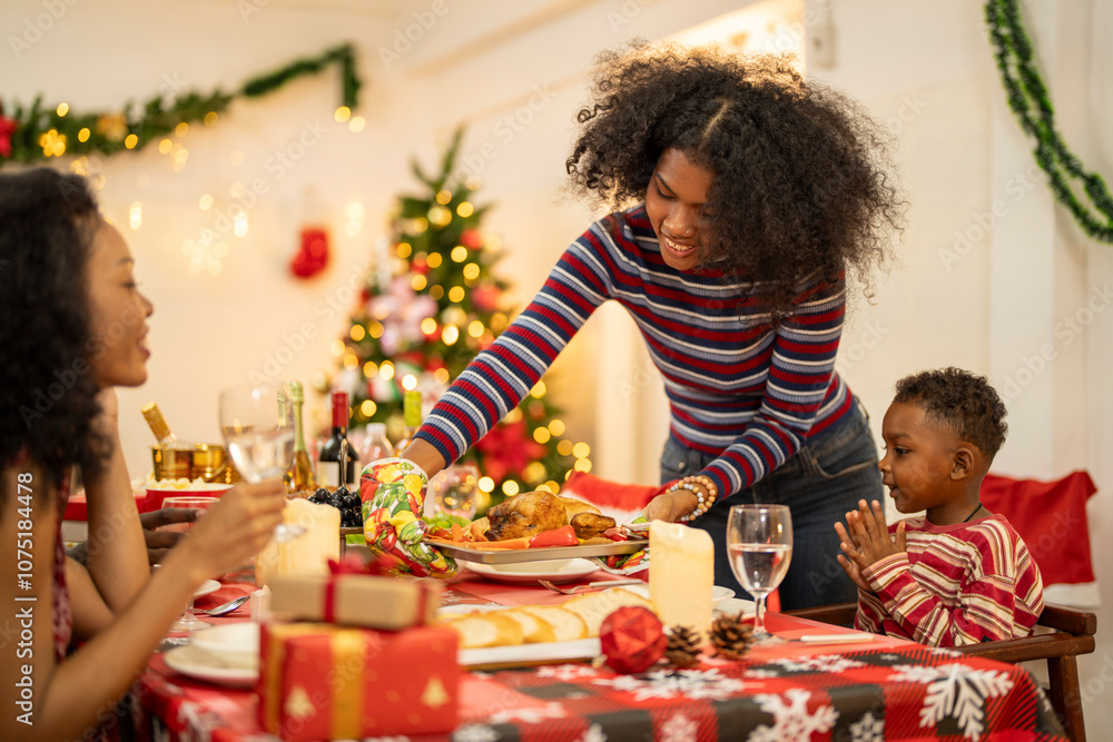 A cheerful holiday dinner scene with a diverse family enjoying a festive meal. Christmas decorations, gifts, and a lit Christmas tree create a cozy atmosphere, enhancing the warmth of the celebration. A cheerful holiday dinner scene with a diverse family enjoying a festive meal. Christmas decorations, gifts, and a lit Christmas tree create a cozy atmosphere, enhancing the warmth of the celebration.