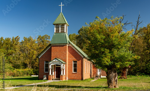 Old red brick church in the country photo