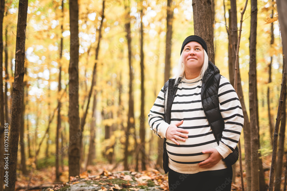 Nice Leabian pregnant woman in autumn park Nice Leabian pregnant woman in autumn park