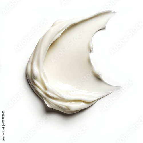 Creamy texture of fresh milk on white isolated background.