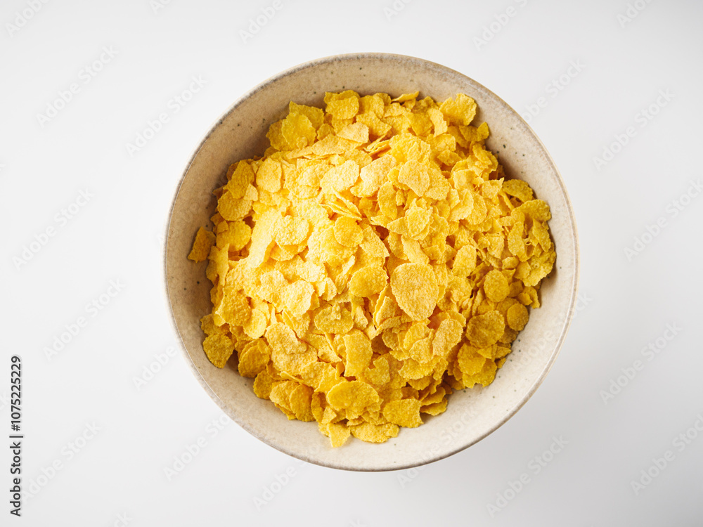 Crispy Corn Flakes with Milk Splash, Healthy Breakfast Cereal in Bowl, Morning Energy Meal Crispy Corn Flakes with Milk Splash, Healthy Breakfast Cereal in Bowl, Morning Energy Meal