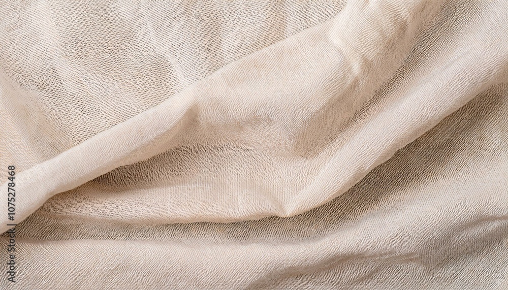 Close-up of a soft, light beige fabric with a subtle texture. Close-up of a soft, light beige fabric with a subtle texture.