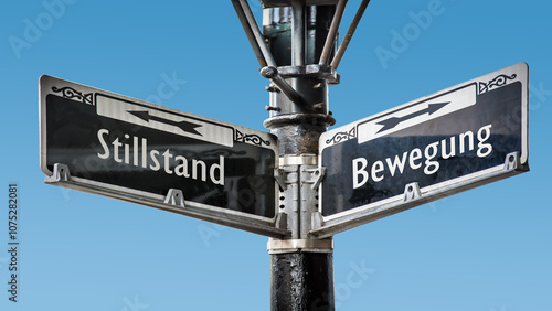 Фотография Signposts the direct way to Movement versus Standstill