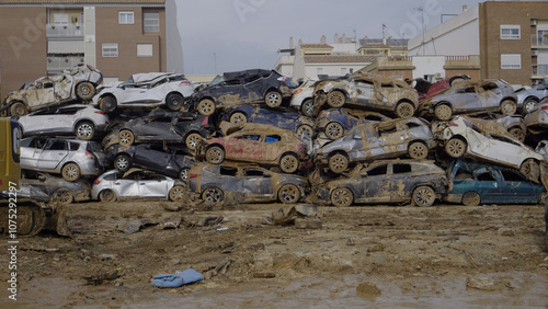 Crowd of cars destroyed by floods in Alfafar, Valencia, Spain. natural disaster.November 2024 photo