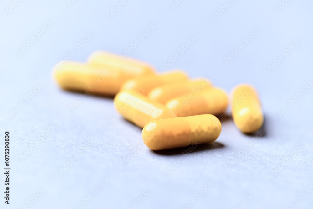 Vitamin C capsules. Bright background. Close up. Copy space. Vitamin C capsules. Bright background. Close up. Copy space.