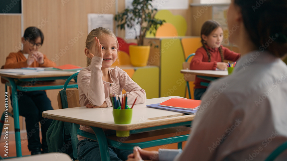 Unrecognizable woman teacher tutor ask children lesson check knowledge of pupils schoolboy little African American boy raise hand answer clever smart child kid son reading in book at class school Unrecognizable woman teacher tutor ask children lesson check knowledge of pupils schoolboy little African American boy raise hand answer clever smart child kid son reading in book at class school