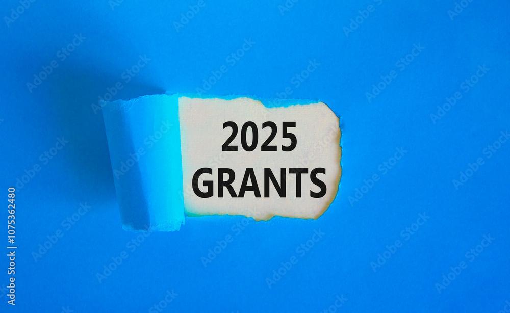 Planning 2025 grants new year symbol. Concept words 2025 Grants on beautiful white paper. Beautiful blue paper background. Business 2025 grants new year concept. Copy space. Planning 2025 grants new year symbol. Concept words 2025 Grants on beautiful white paper. Beautiful blue paper background. Business 2025 grants new year concept. Copy space.