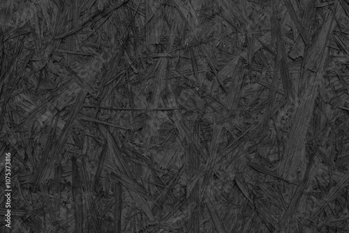 Textured Black OSB (Oriented Strand Board) Surface
