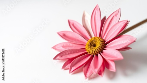 Detailed close-up of origami daisy flower on white background paper, foldable, white background