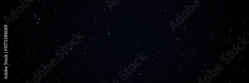 Dark canvas of night sky with scattered stars twinkling in shades of blue and white on a deep black background, celestial bodies, nocturnal scene, astronomy