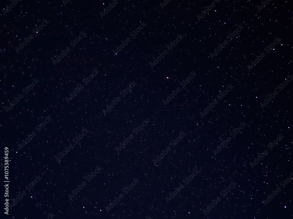 Fototapeta premium Starry night sky with a focus on the constellations Orion and Cassiopeia, night sky, nebulae