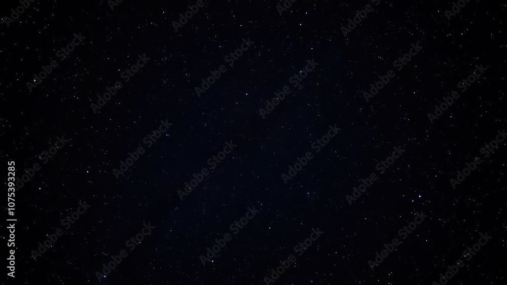 The darkness of space is punctuated by a scattering of twinkling stars against the vast expanse of the galaxy, stardust, universe, cosmos The darkness of space is punctuated by a scattering of twinkling stars against the vast expanse of the galaxy, stardust, universe, cosmos
