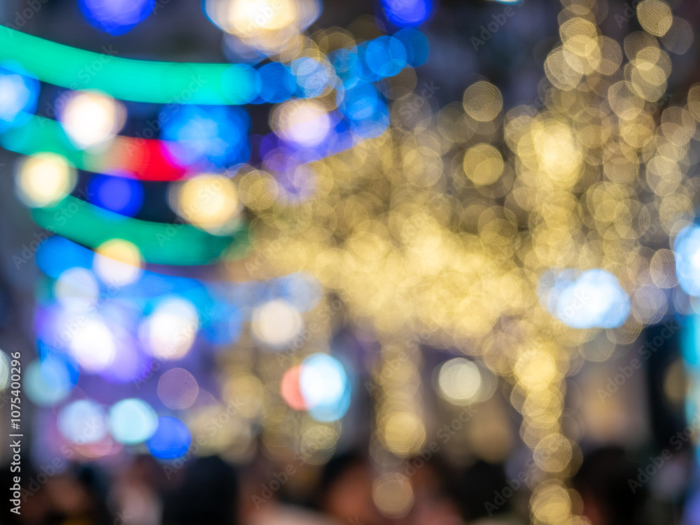 Blurring out of focus bokeh light from light bulb in decoration alley, for background Blurring out of focus bokeh light from light bulb in decoration alley, for background