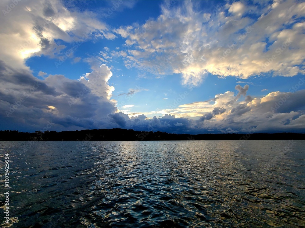 The calming beauty of the ocean under a dramatic evening sky. The calming beauty of the ocean under a dramatic evening sky.