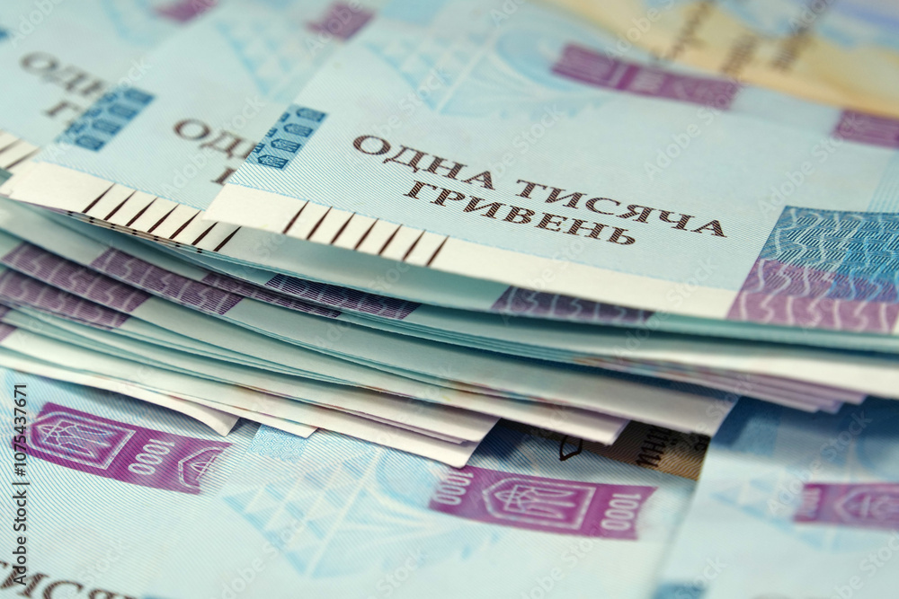 Banknotes 1000 Hryvnia. Real Ukrainian paper money of blue yellow color Banknotes 1000 Hryvnia. Real Ukrainian paper money of blue yellow color