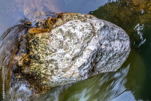 Rock in the river current