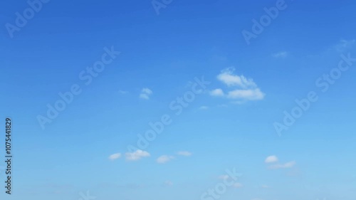 Time lapse of beautiful blue sky with white clouds