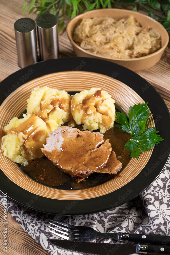 Braised pork neck in own sauce. Shallow depth of field. Braised pork neck in own sauce. Shallow depth of field.