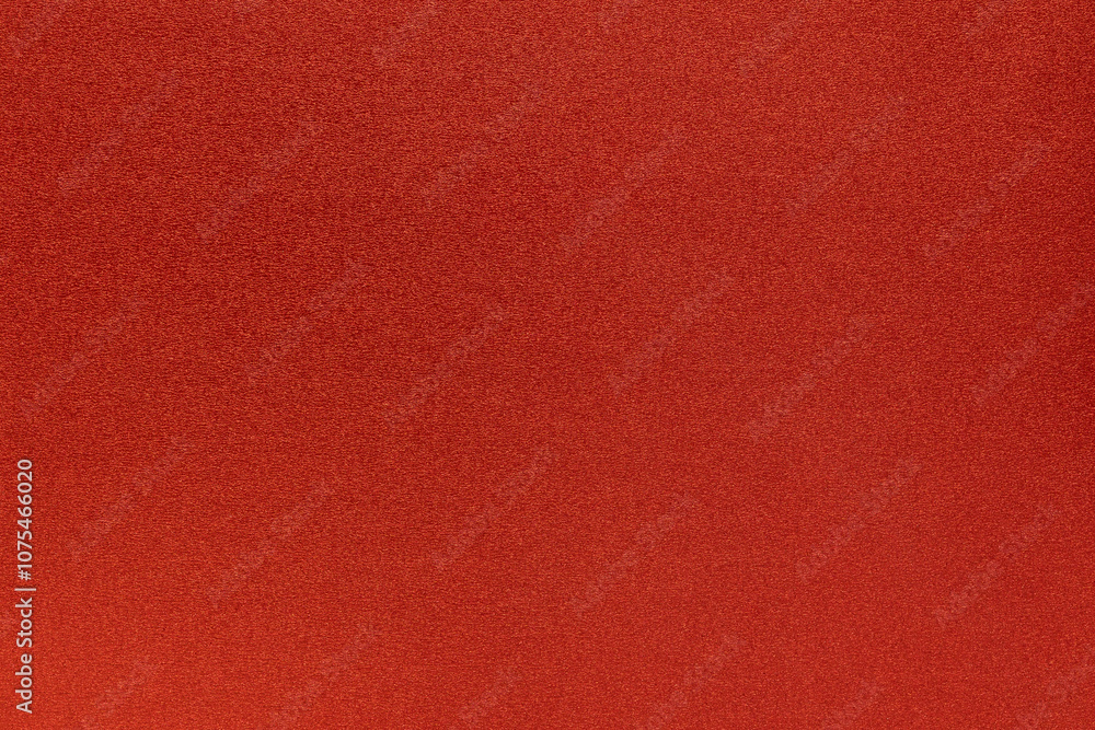Fondo texturizado color rojo de material de goma Eva con brillantina Fondo texturizado color rojo de material de goma Eva con brillantina