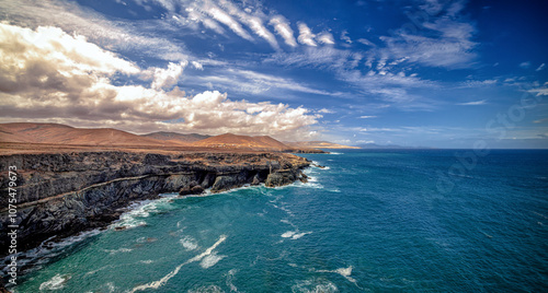 Panorama der Bucht und den Piraten Höhlen von Ajuy auf Fuerteventura. Türkisblauer atlantischer Ozean. photo