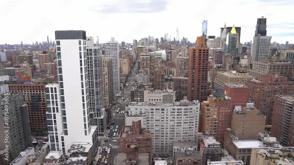 New York Midtowm buildings and street full of cars, wide angle view., mix of old and new skyscrapers, view from rooftop. Aerial view,.