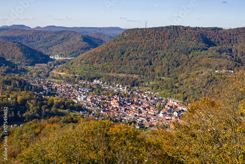 view from above of Annweiler a small town in the autumnal Palatinate forest in sunshine photo