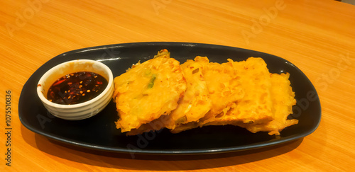 breakfast of crispy fried tempeh with soy sauce in a bowl