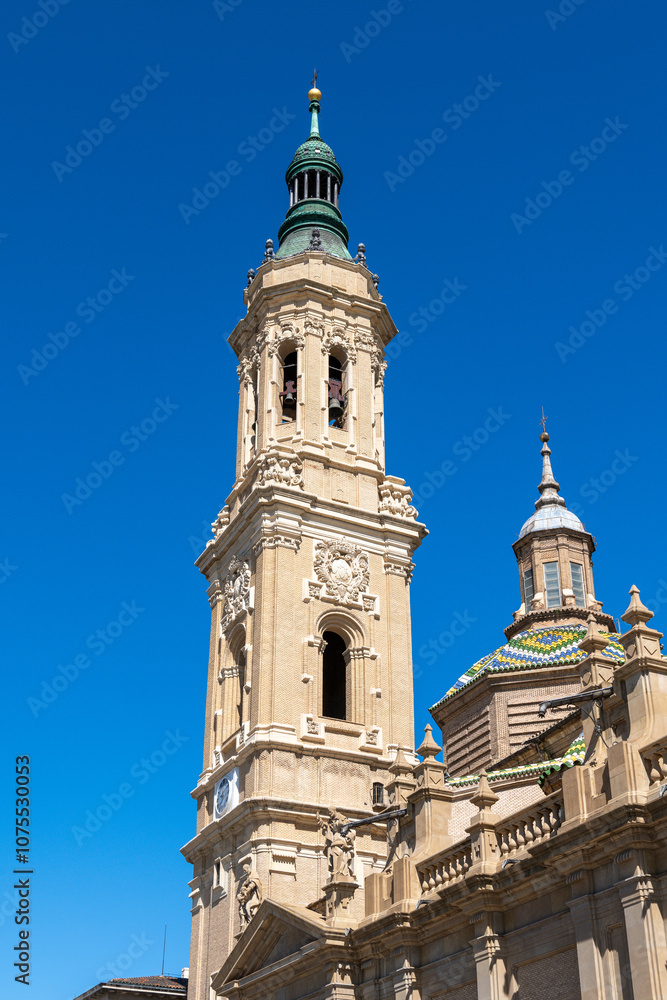 Intricate bell tower of Basilica del Pilar with colorful dome. Intricate bell tower of Basilica del Pilar with colorful dome.